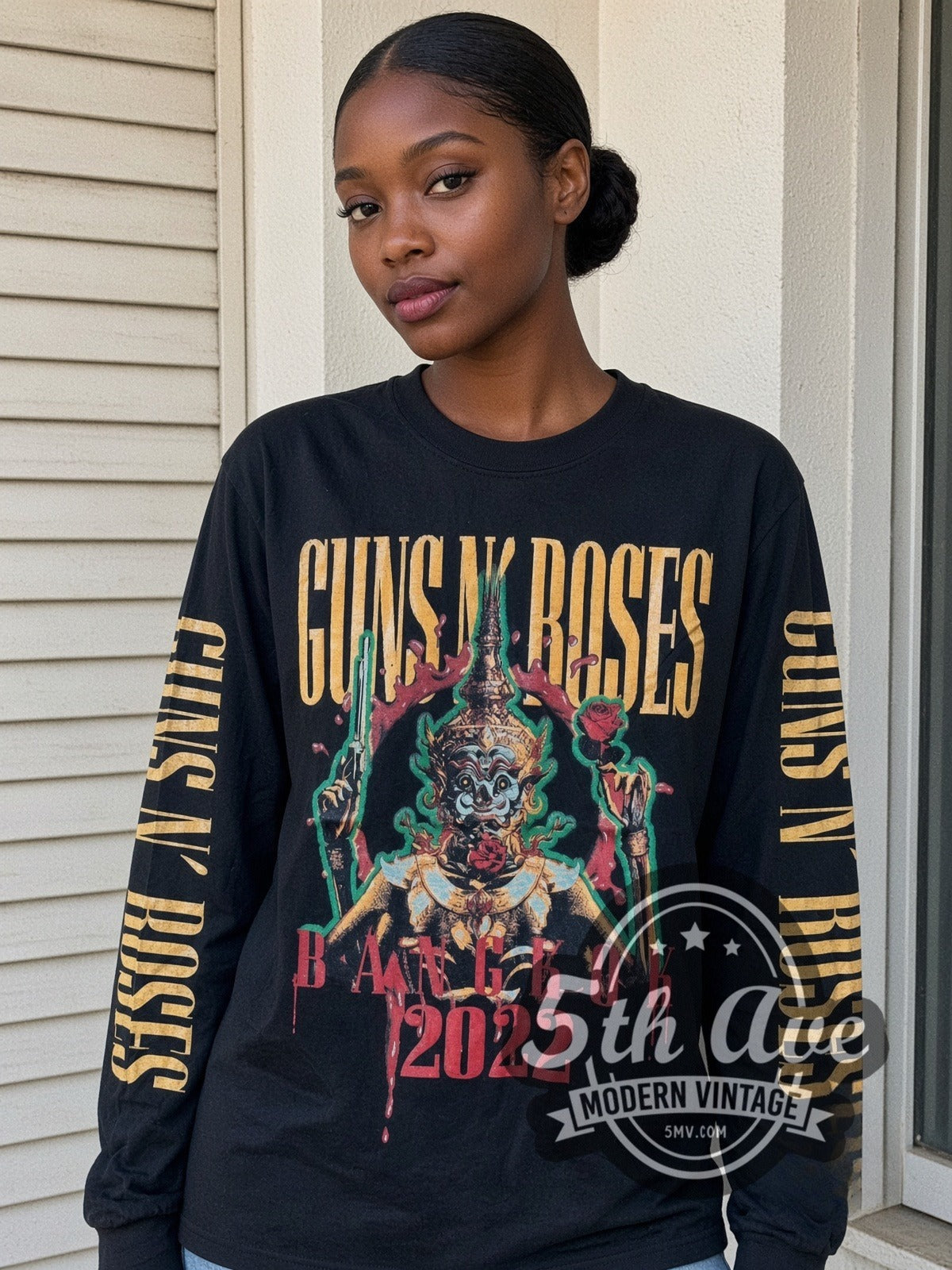 Model wearing the Guns N' Roses 2022 Concert Date vintage band long sleeve t-shirt