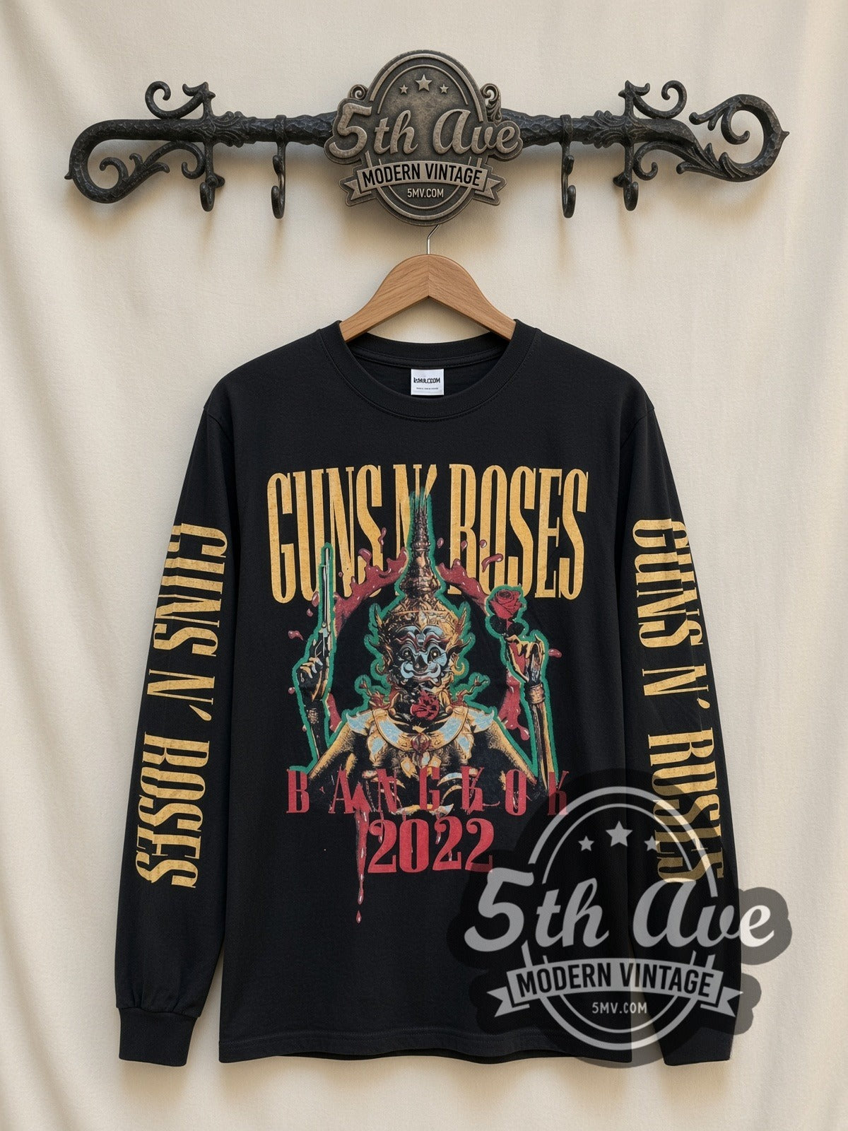 Guns N' Roses 2022 Concert Date vintage band long sleeve t-shirt, front view on a display rack