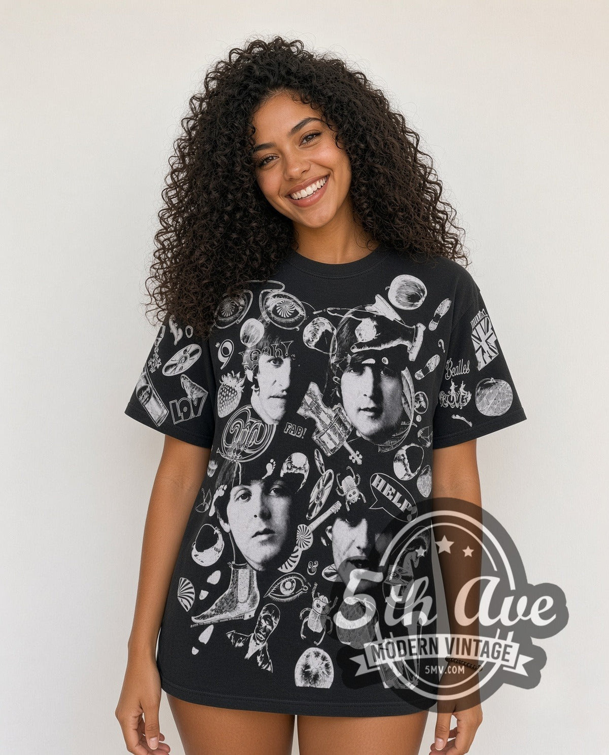 Model wearing The Beatles Help Collage all-over-print vintage band t-shirt in black