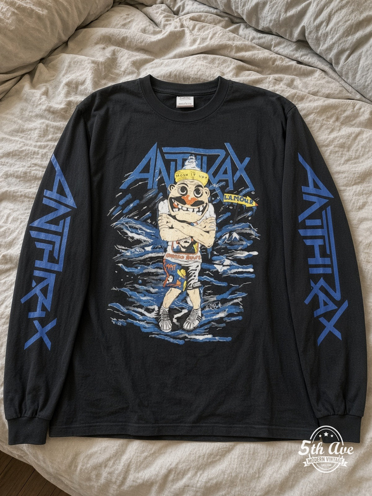 ETS LS 41 Anthrax L'Amour Cartoon long sleeve vintage tee laid on a bed