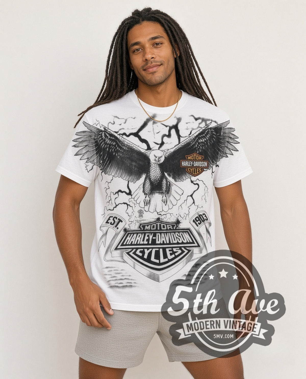 Model wearing the Harley-Davidson Eagle Lightning EST 1903 all-over-print vintage Harley tee in white