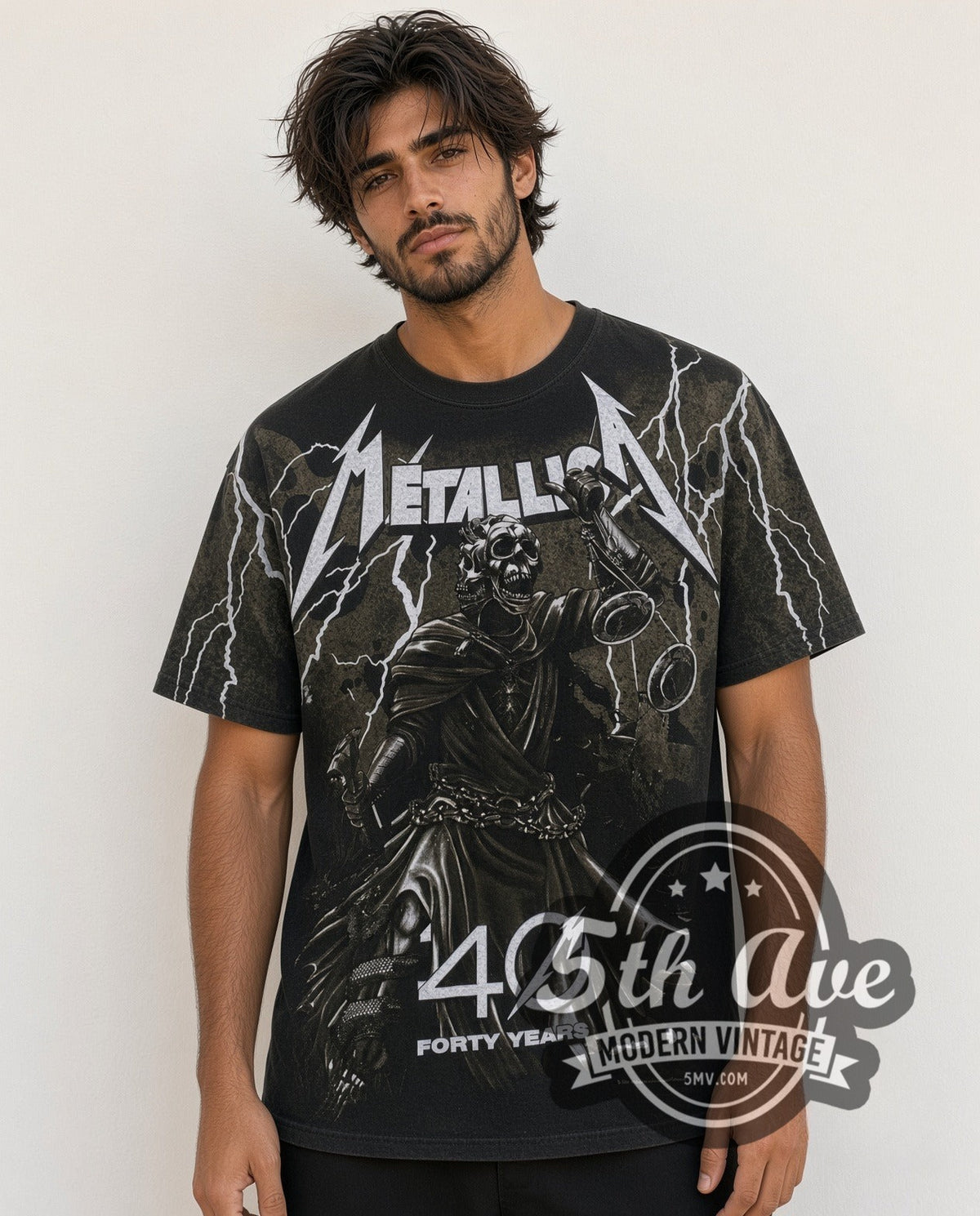 Model wearing the Metallica 40 Years Lady Justice all-over-print vintage band t-shirt in black