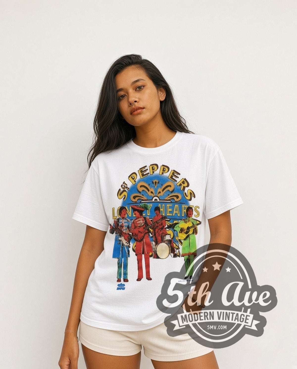 Model wearing The Beatles Sgt Peppers vintage band t-shirt in white