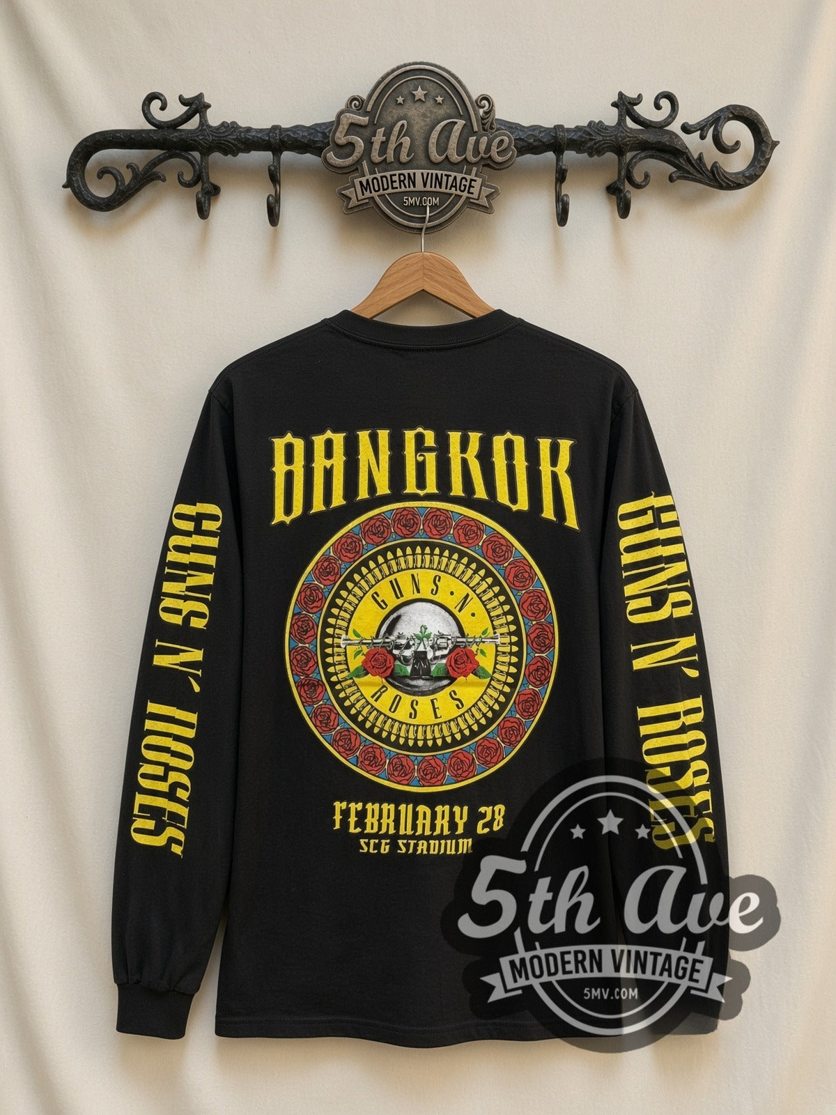 Guns N' Roses February 28 Concert Date vintage band long sleeve t-shirt, back view on a display rack