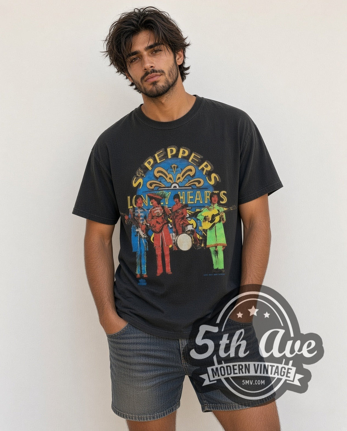 Model wearing The Beatles Sgt Peppers vintage band t-shirt in black