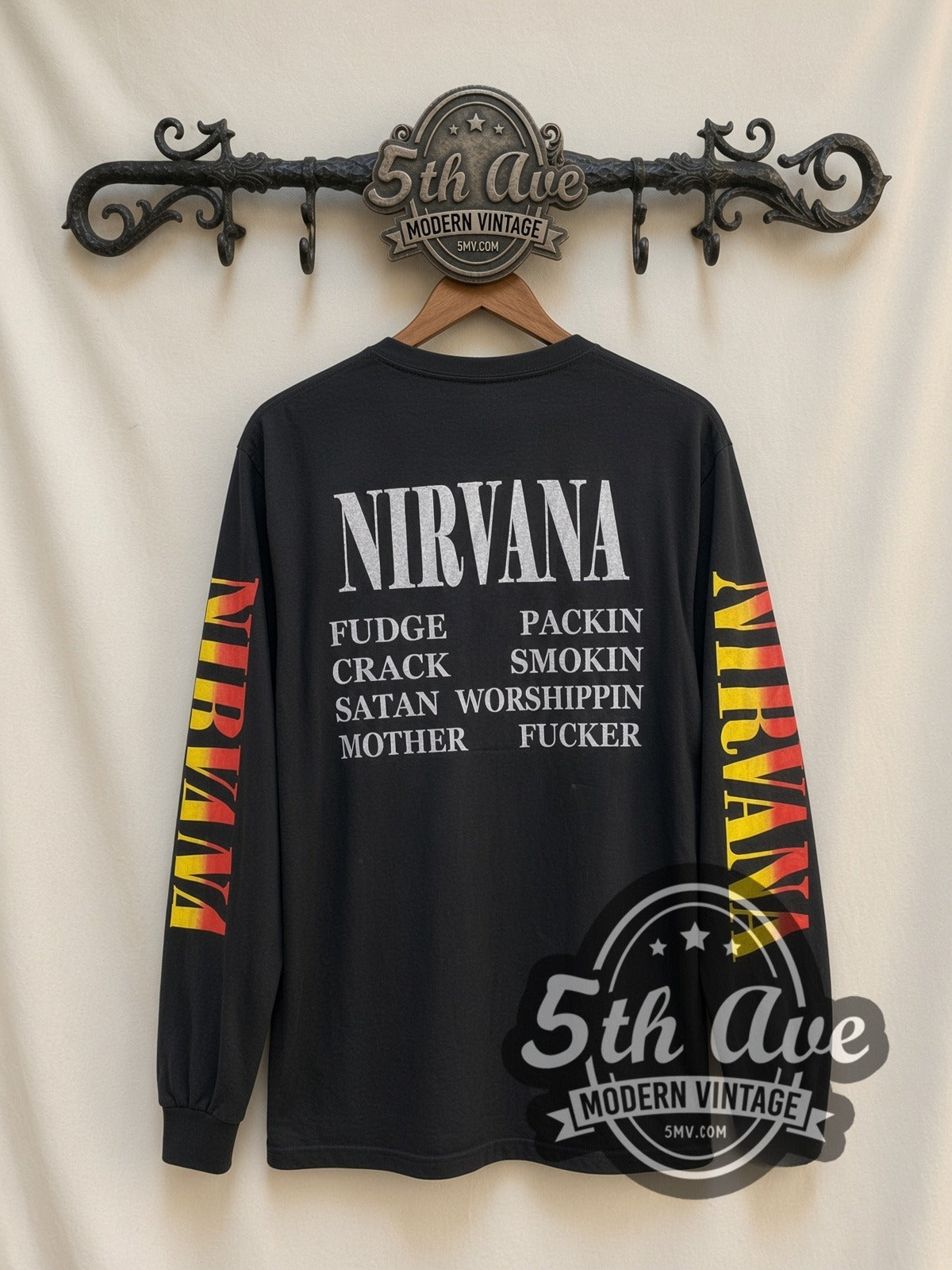 Nirvana Bobcats Photo vintage band long sleeve t-shirt, back view on a display rack
