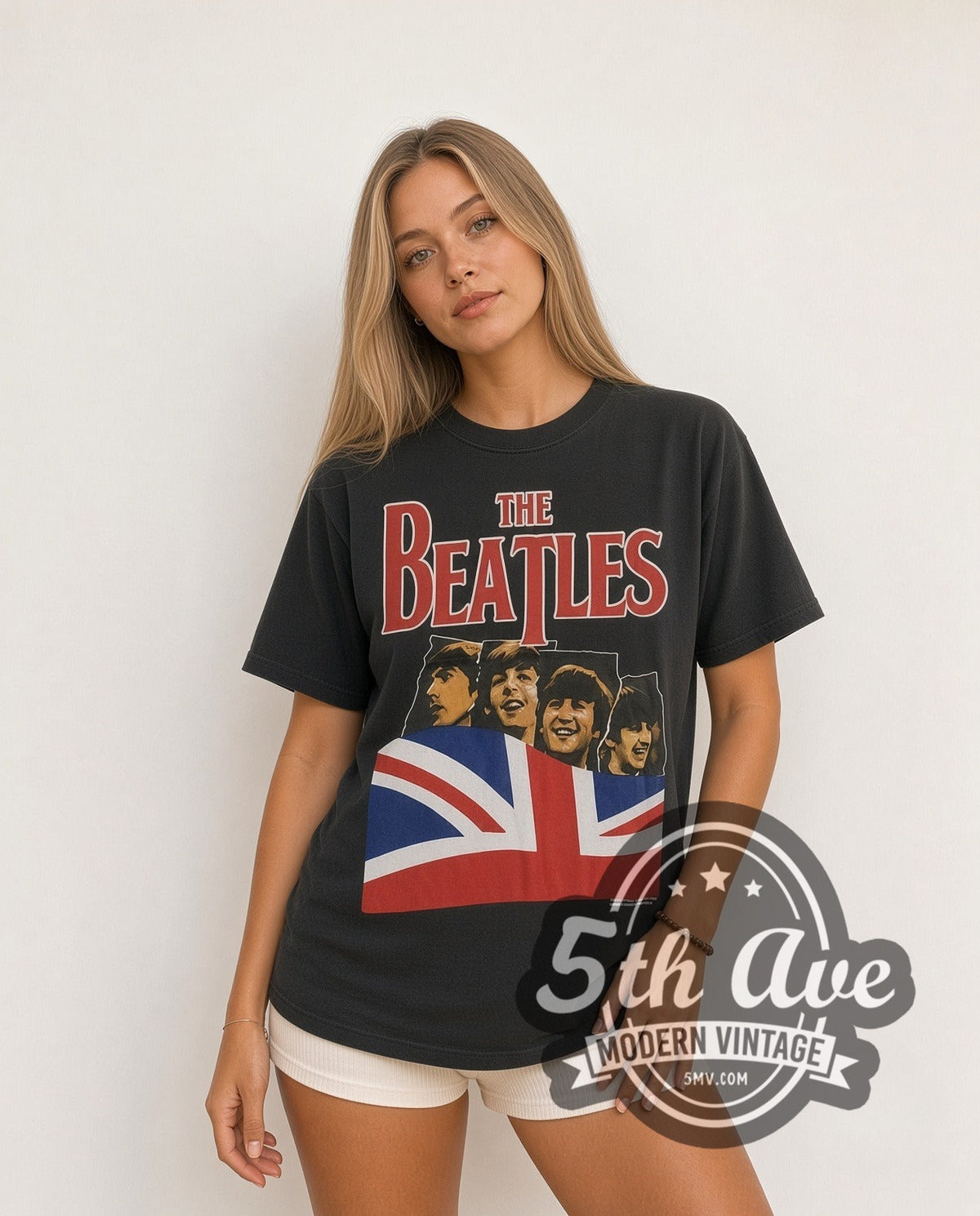 Model wearing The Beatles Union Jack vintage band t-shirt in black
