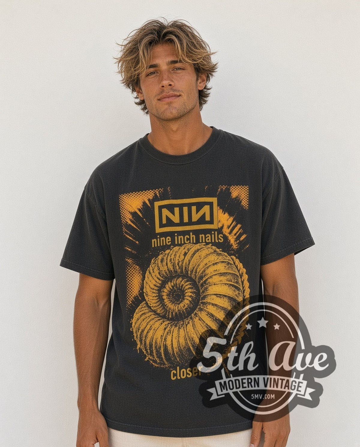 Model wearing the Nine Inch Nails Closer / Downward Spiral vintage band t-shirt