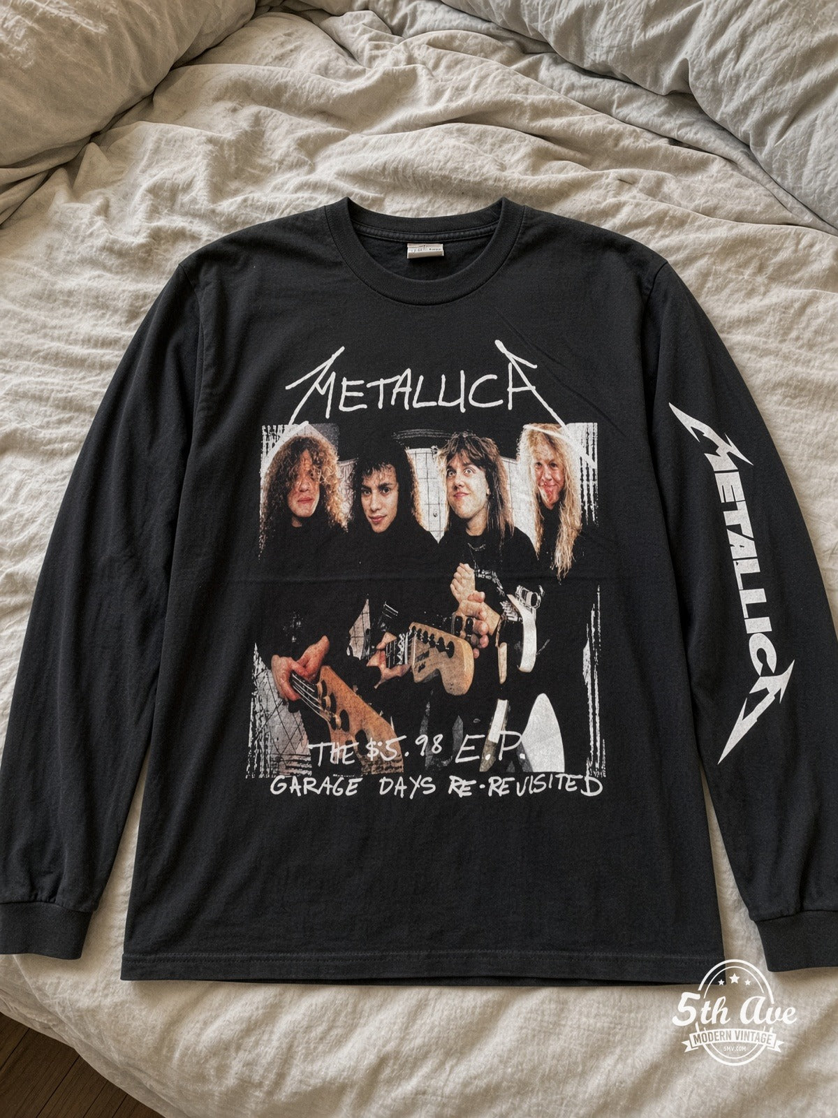 ETS LS 45 Metallica Garage Days Re-Revisited long sleeve vintage tee laid on a bed