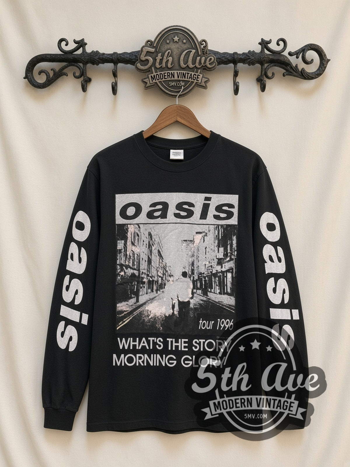 Oasis Morning Glory Tour 1996 vintage band long sleeve t-shirt, front view on a display rack