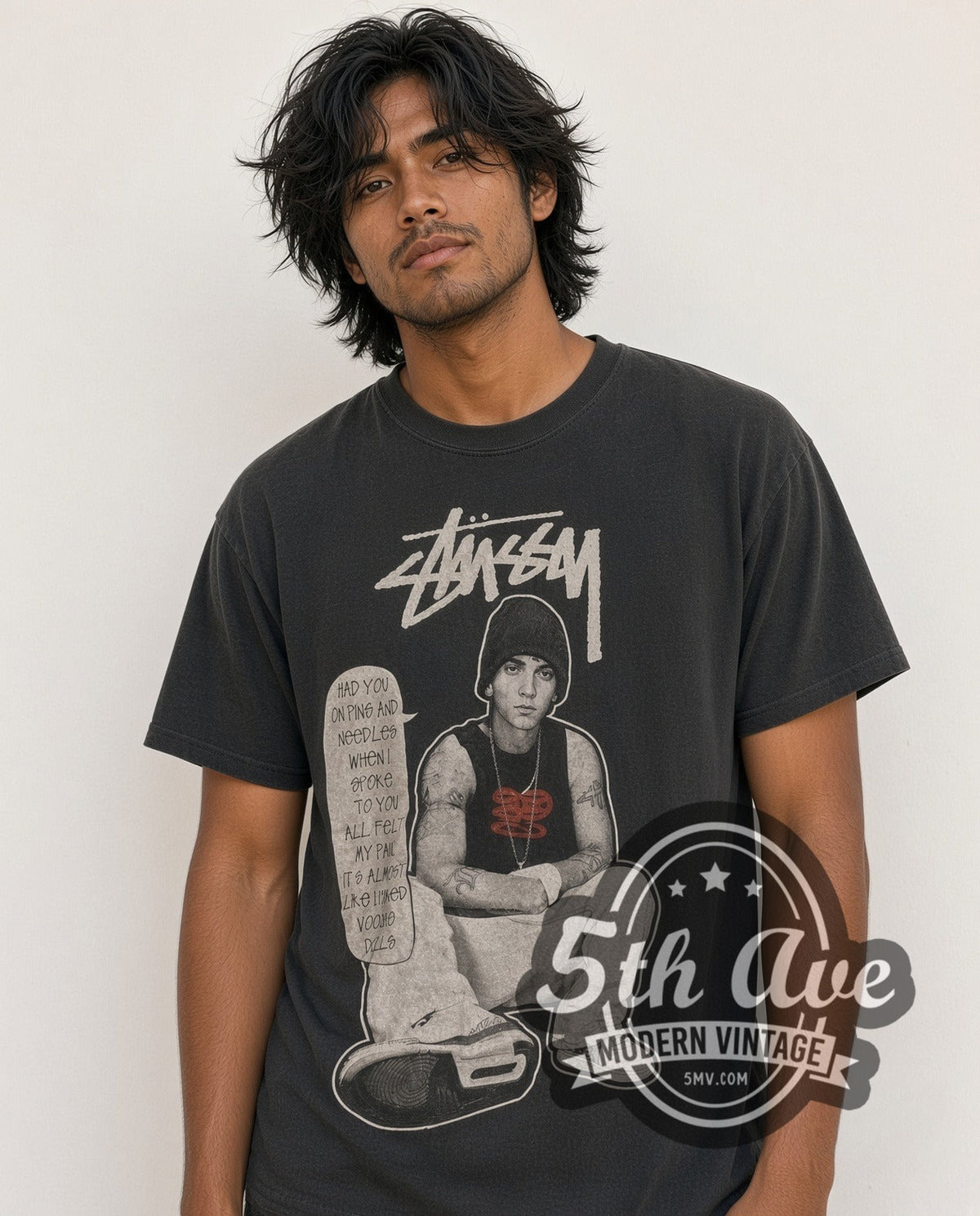 Model wearing the Eminem × Stüssy Pins and Needles vintage band t-shirt