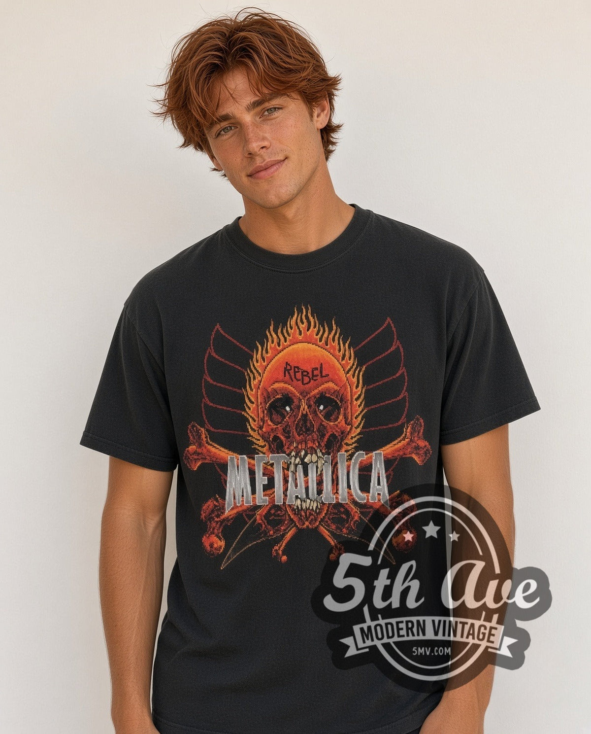 Model wearing the Metallica Rebel Flaming Skull vintage band t-shirt in black