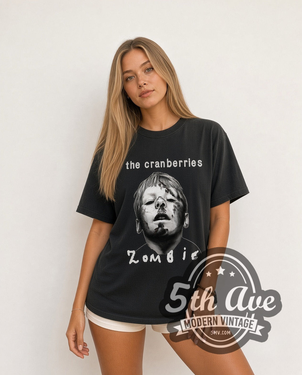 Model wearing The Cranberries Zombie vintage band t-shirt in black