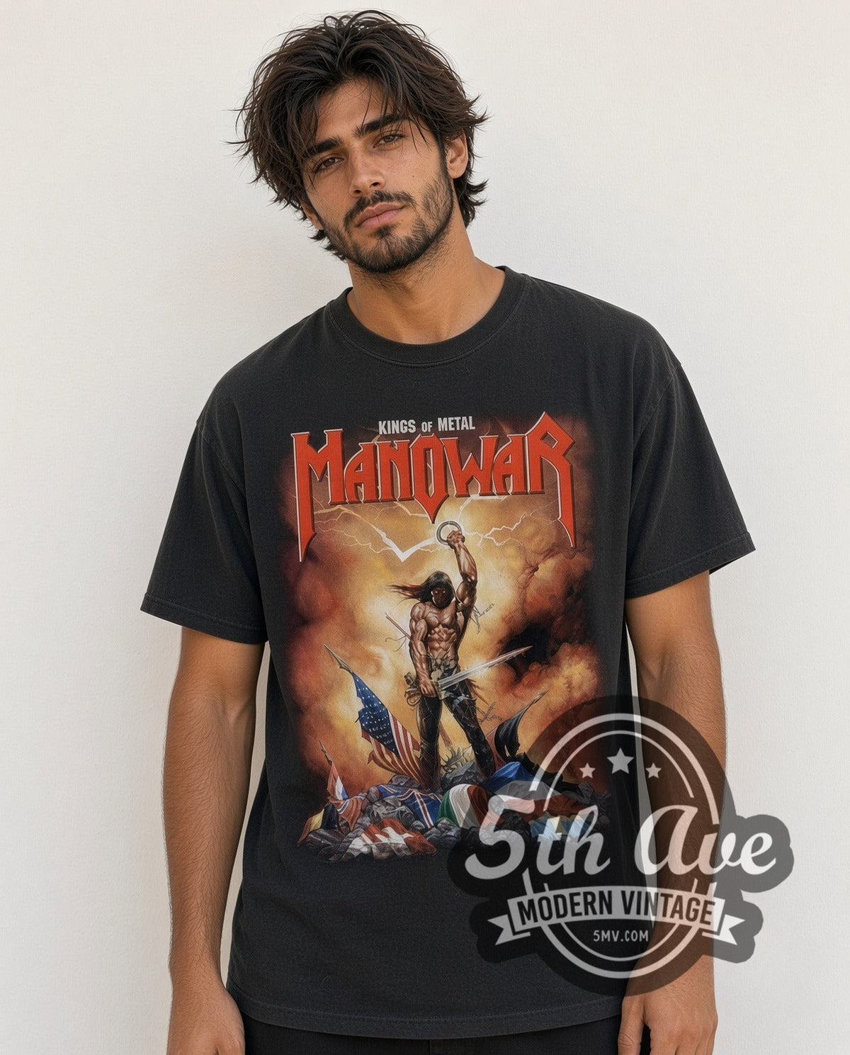 Model wearing the Manowar Kings of Metal vintage band t-shirt in black