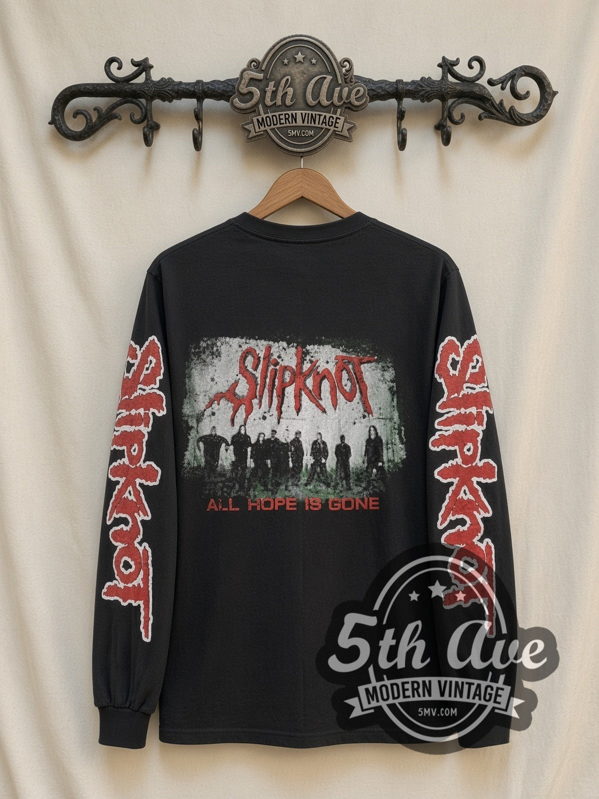 Slipknot Masks Star Logo vintage band long sleeve t-shirt, back view on a display rack