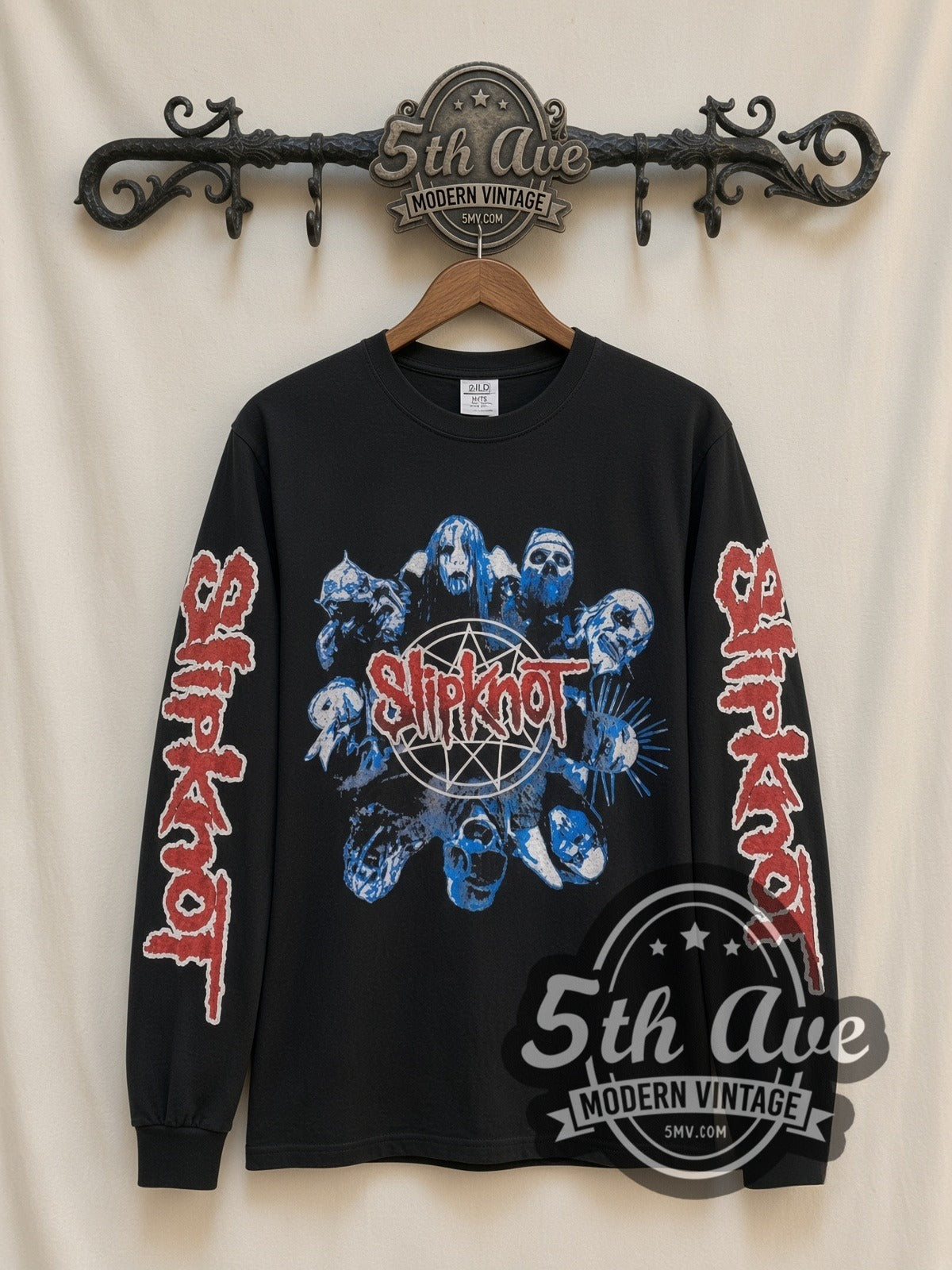 Slipknot Masks Star Logo vintage band long sleeve t-shirt, front view on a display rack
