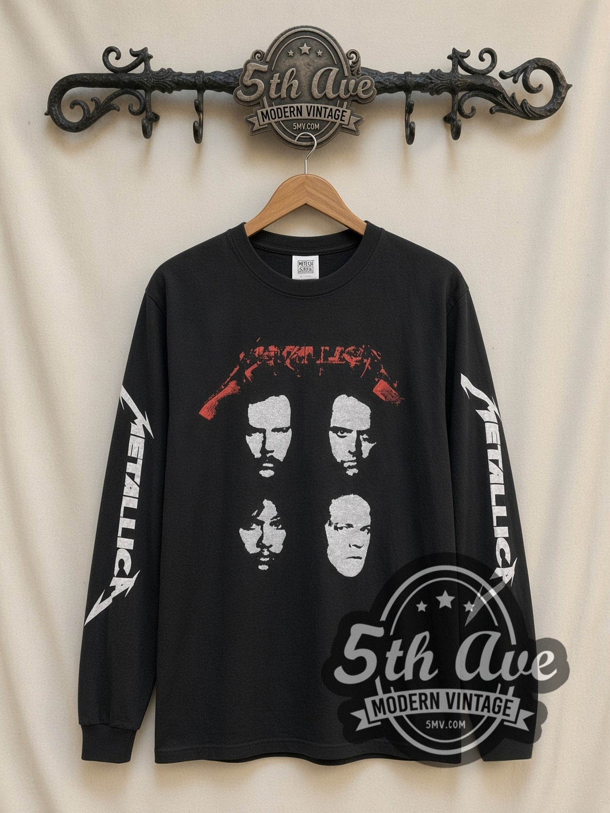 Metallica Four Faces vintage band long sleeve t-shirt, front view on a display rack