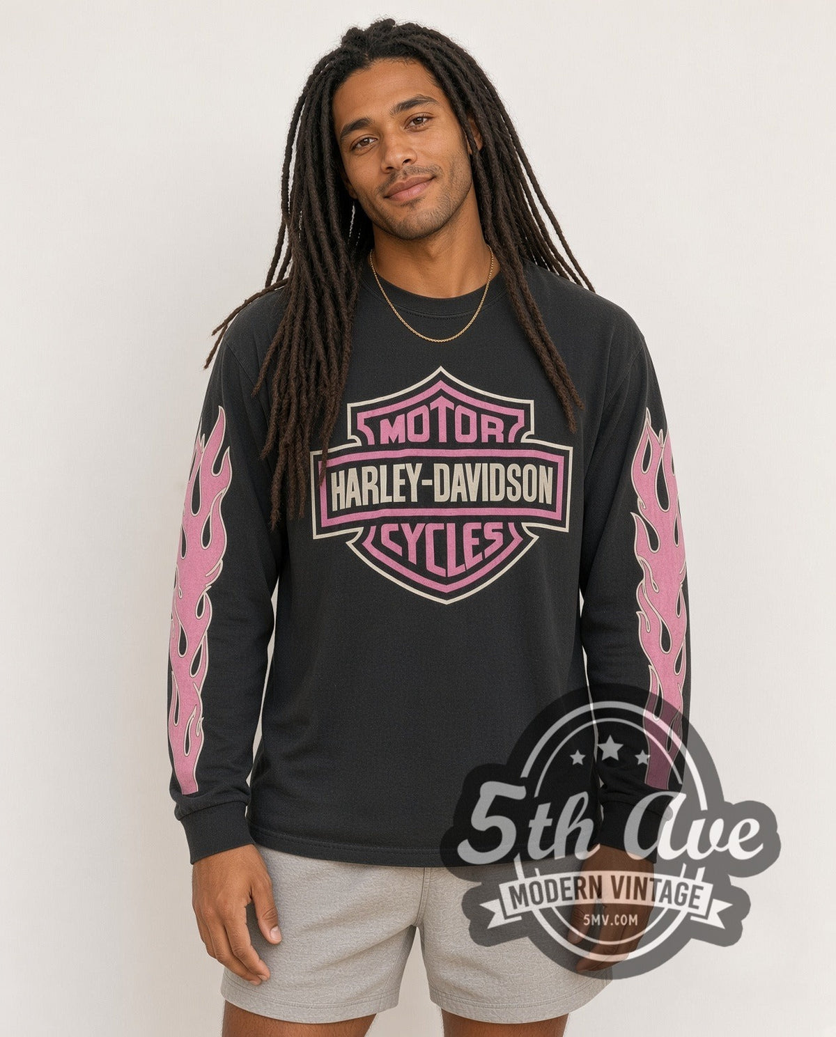 Model wearing the Harley-Davidson Wisconsin Oconomowoc Pink Shield vintage graphic long sleeve t-shirt
