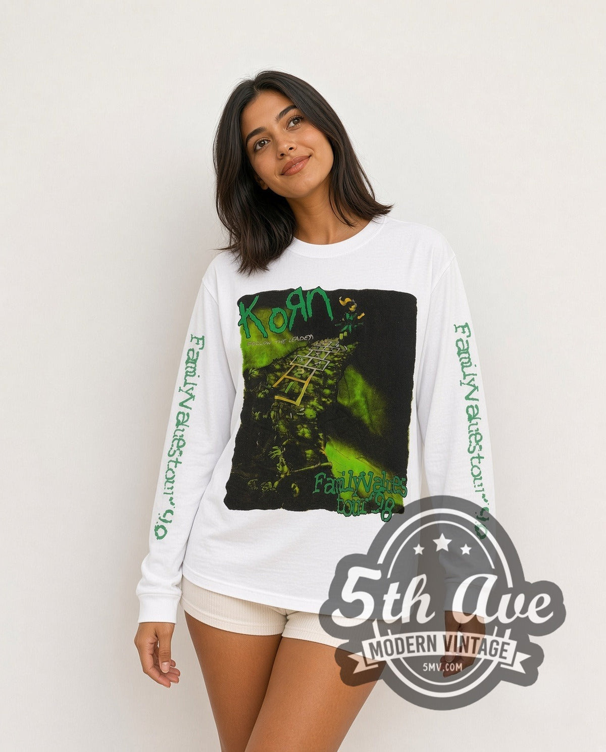 Model wearing the Korn Follow the Leader Family Values Tour 98 Long Sleeve vintage band t-shirt in white