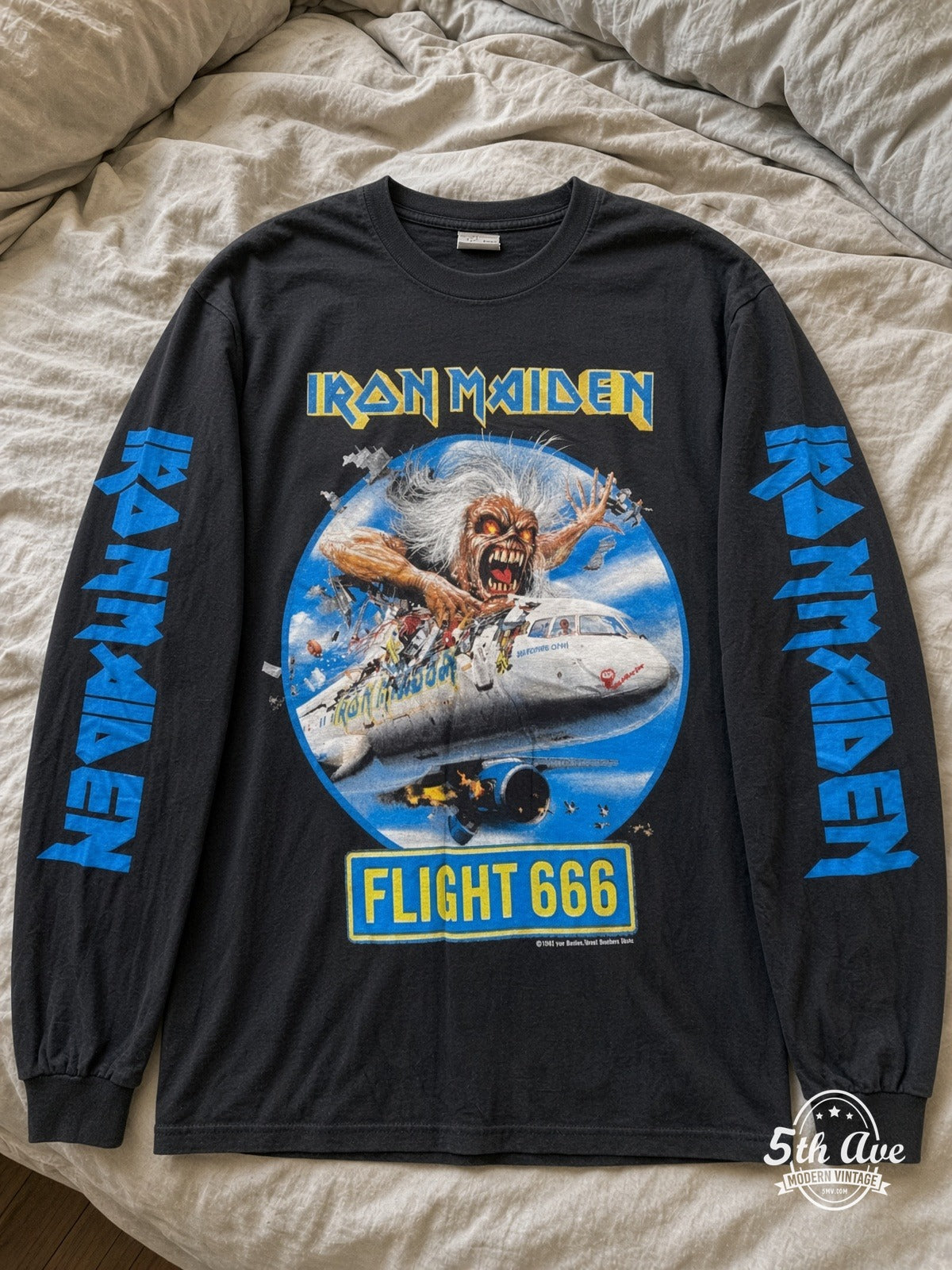 ETS LS 53 Iron Maiden Flight 666 long sleeve vintage tee laid on a bed
