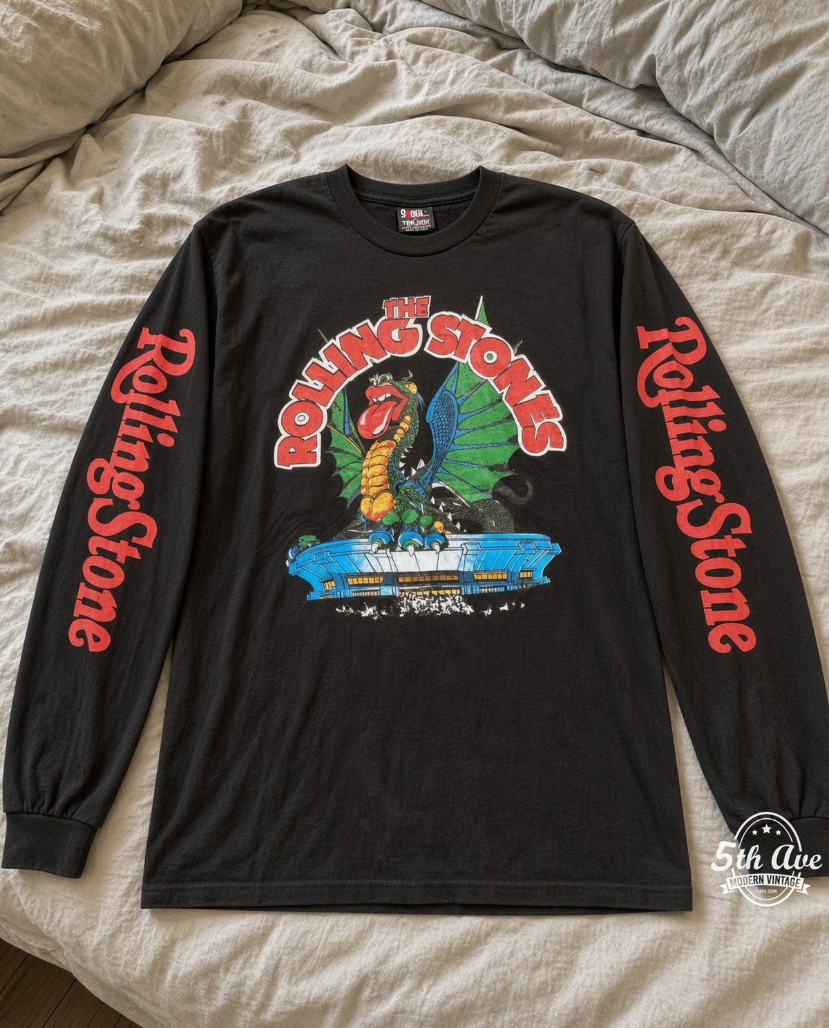 ETS LS 56 The Rolling Stones Dragon Stadium long sleeve vintage tee laid on a bed