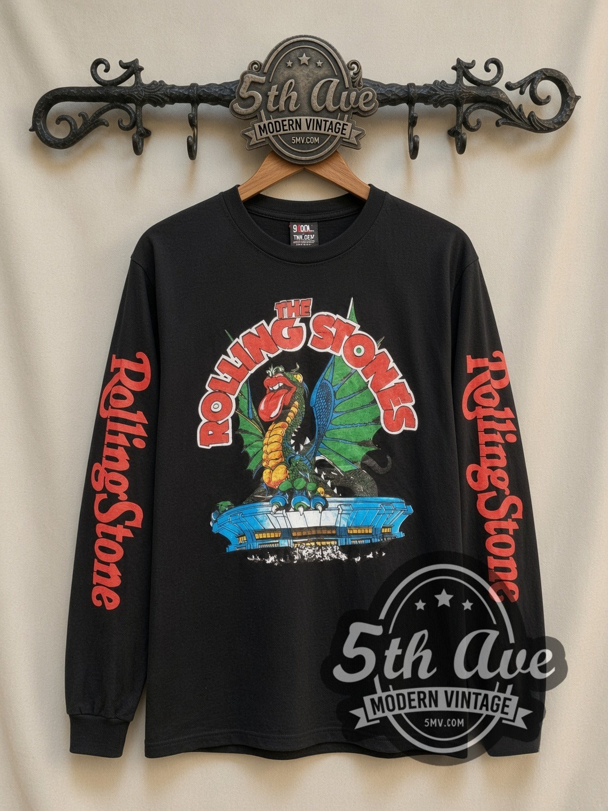 The Rolling Stones Dragon Stadium vintage band long sleeve t-shirt, front view on a display rack
