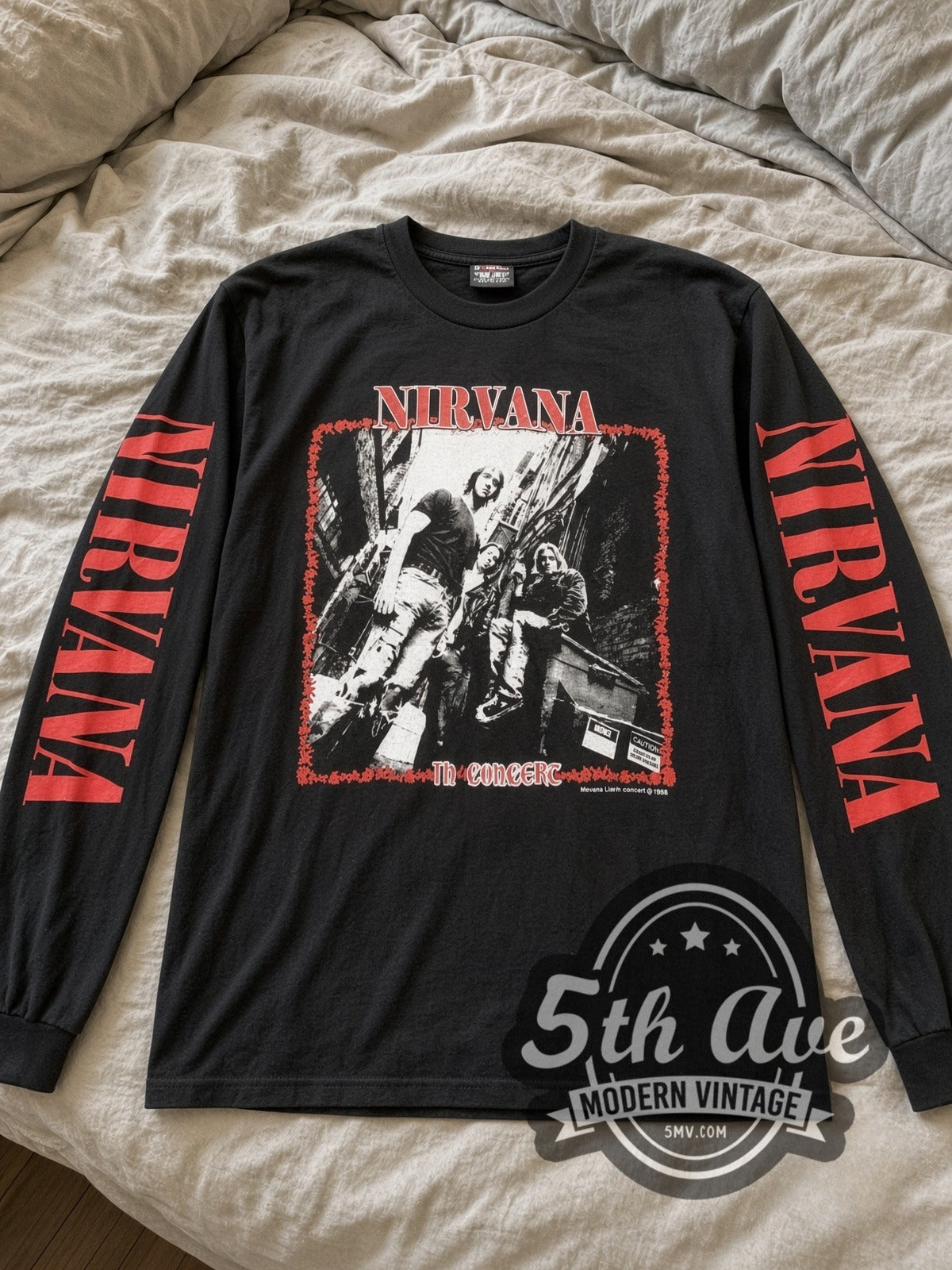 Nirvana In Concert vintage band long sleeve tee laid flat