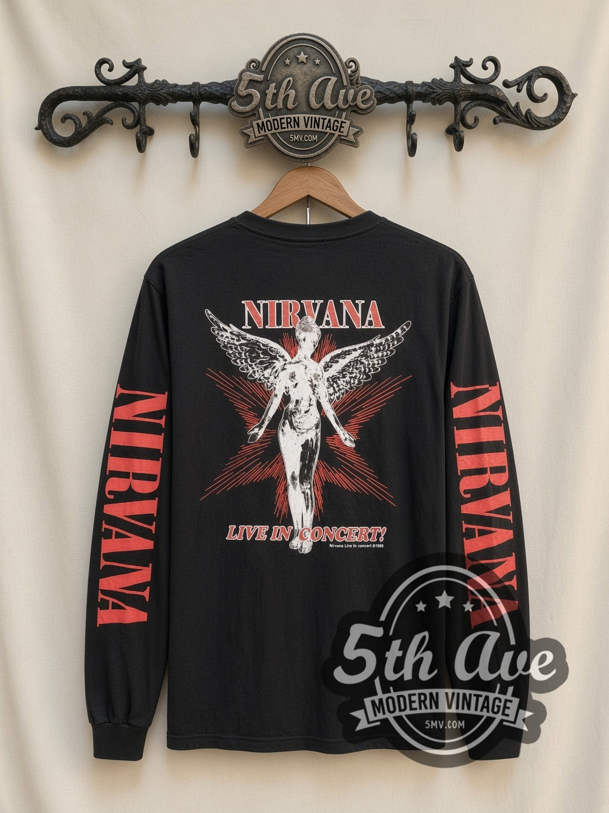 Nirvana In Concert vintage band long sleeve t-shirt, back view on a display rack