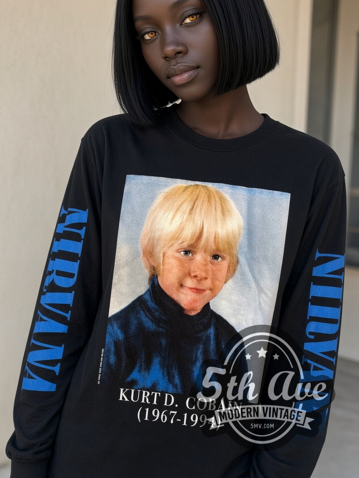Model wearing the Nirvana Kurt D. Cobain 1967-1994 Childhood vintage band long sleeve t-shirt