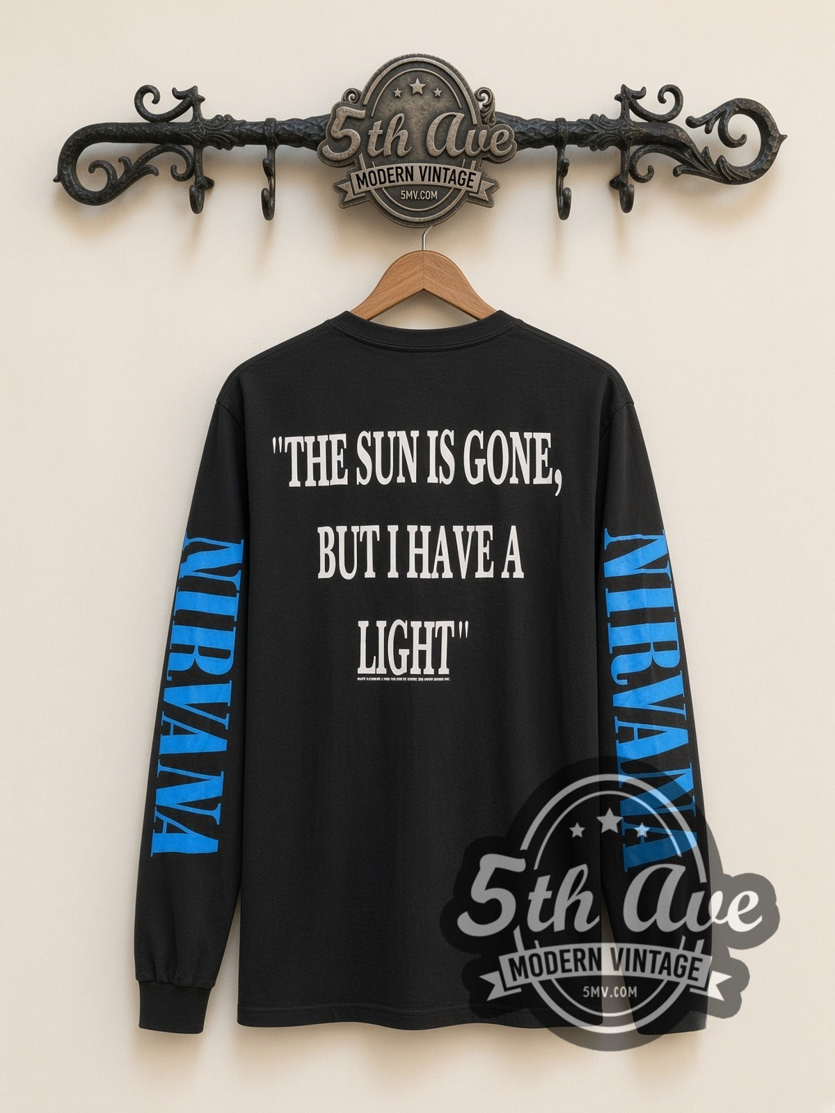 Nirvana Kurt D. Cobain 1967-1994 Childhood vintage band long sleeve t-shirt, back view on a display rack