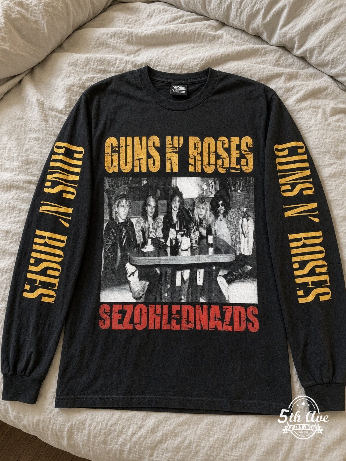 ETS LS 59 Guns N' Roses Band Table Photo long sleeve vintage tee laid on a bed