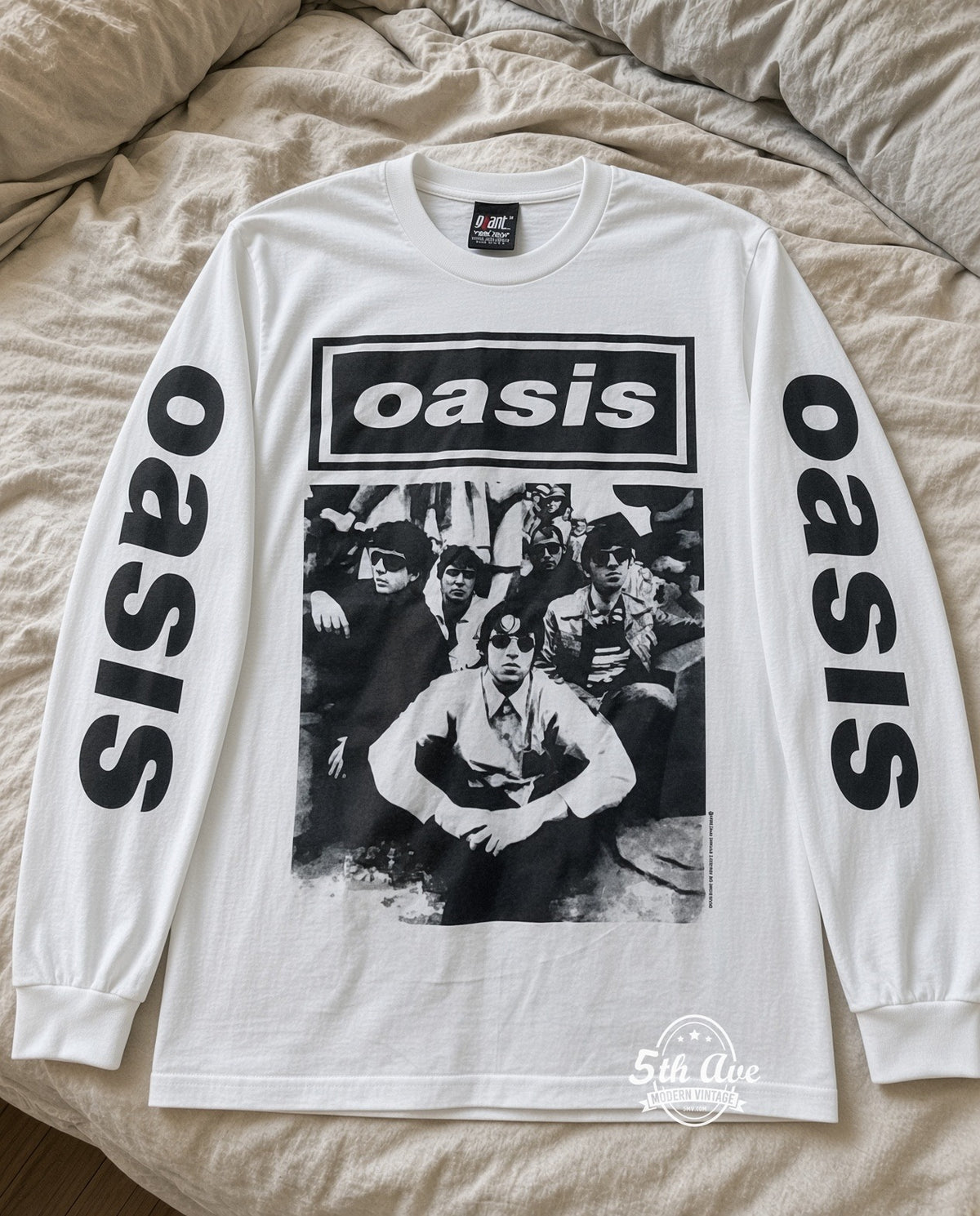 ETS LS 60 Oasis Band Photo long sleeve vintage tee laid on a bed
