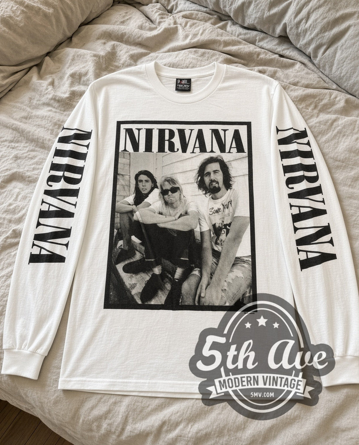 Nirvana Seated Trio vintage band long sleeve tee laid flat