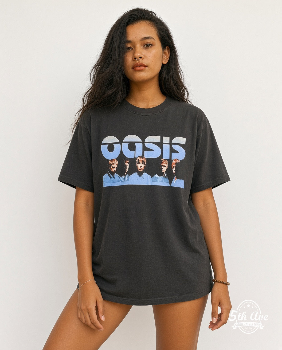 Model wearing the Oasis World Tour 2002 vintage band t-shirt in black