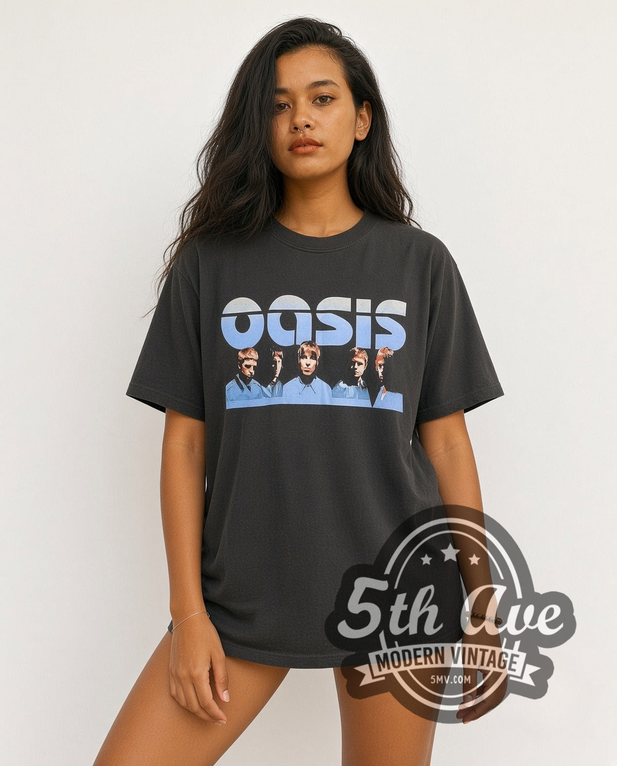 Model wearing the Oasis World Tour 2002 vintage band t-shirt in black