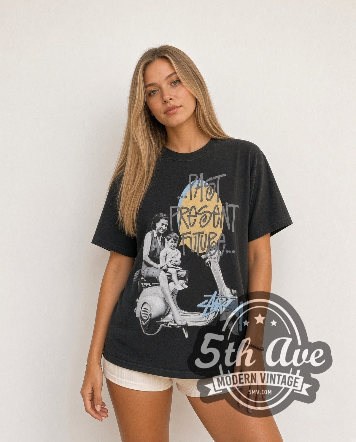 Model wearing the Stussy Past Present Future vintage graphic tee in black