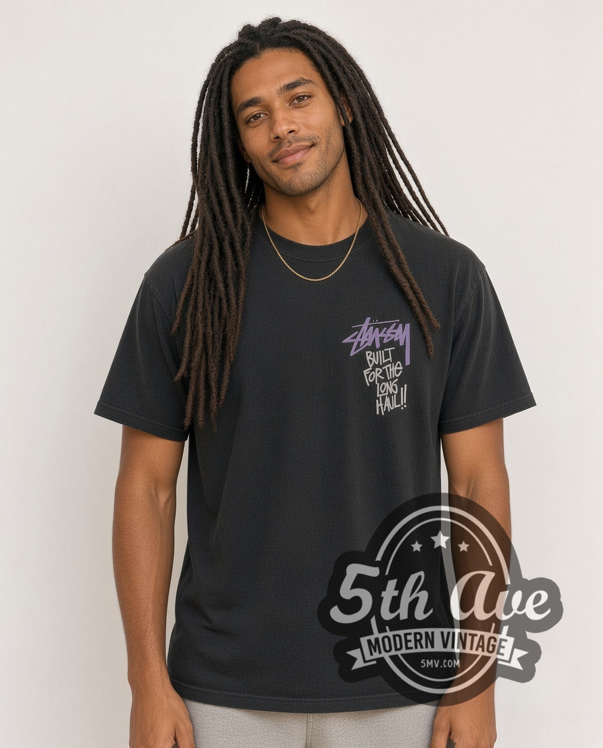 Model wearing the Stussy Built for the Long Haul vintage graphic tee in black