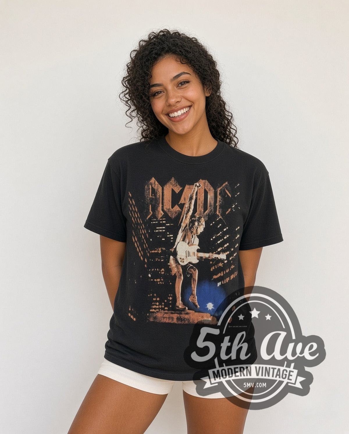 Model wearing the AC/DC Angus Live vintage band t-shirt in black