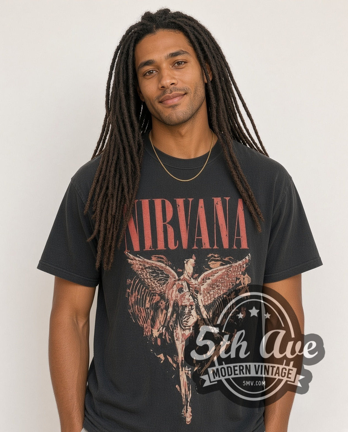 Model wearing the Nirvana In Utero Distressed Angel Yellow Back Print vintage band t-shirt in black