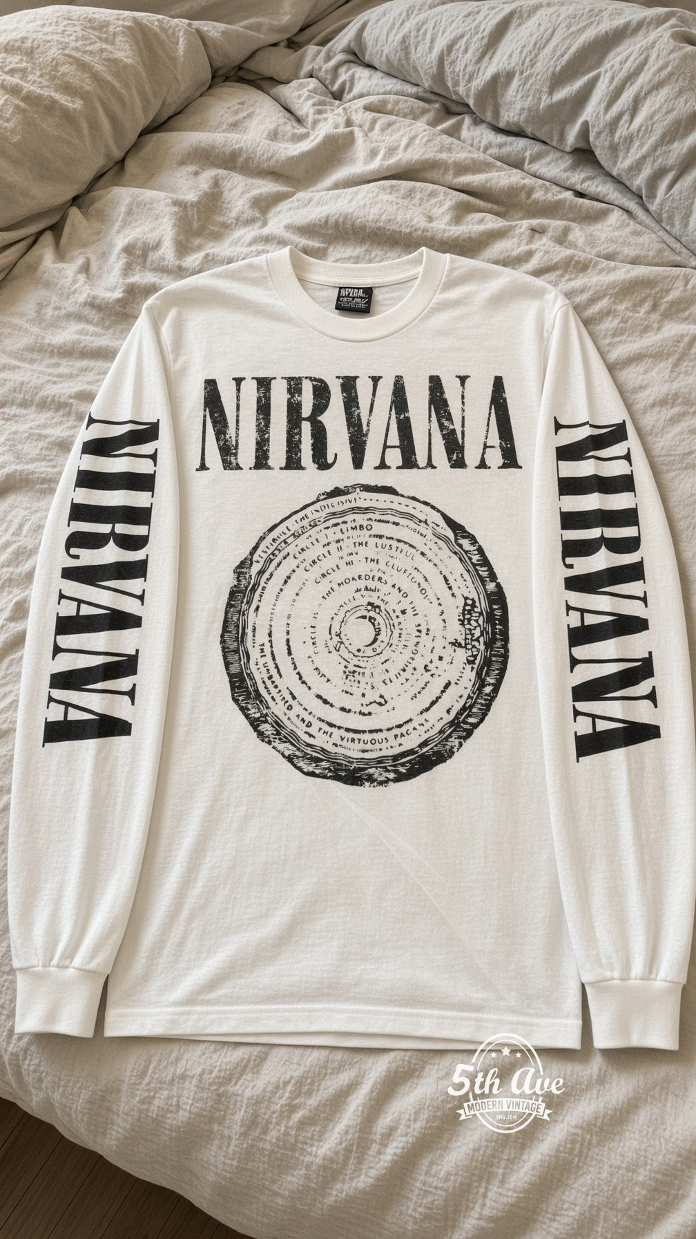 ETS LS 70 Nirvana Vestibule long sleeve vintage tee laid on a bed