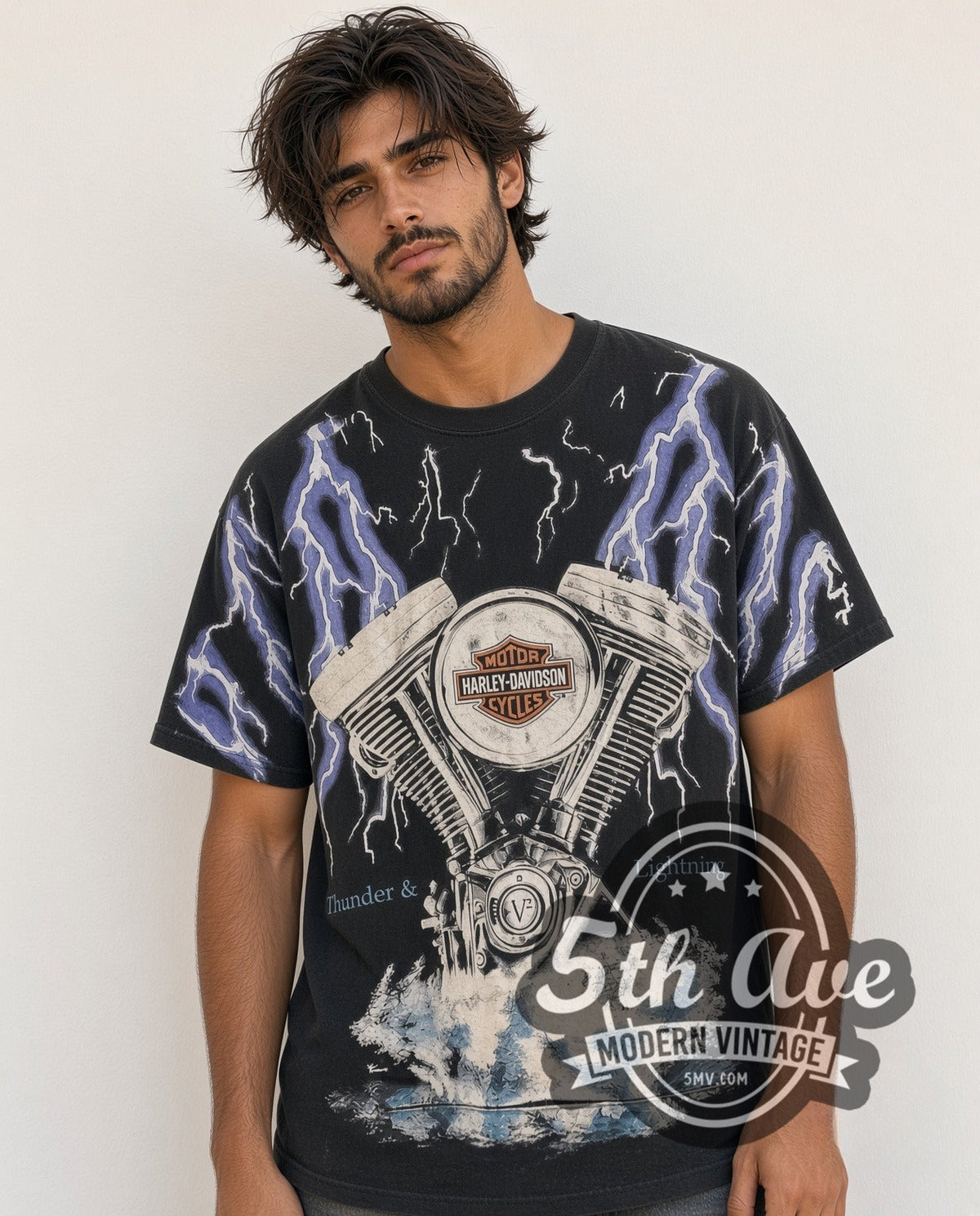 Model wearing the Harley-Davidson Thunder and Lightning C&C Russell IA all-over-print graphic tee in black