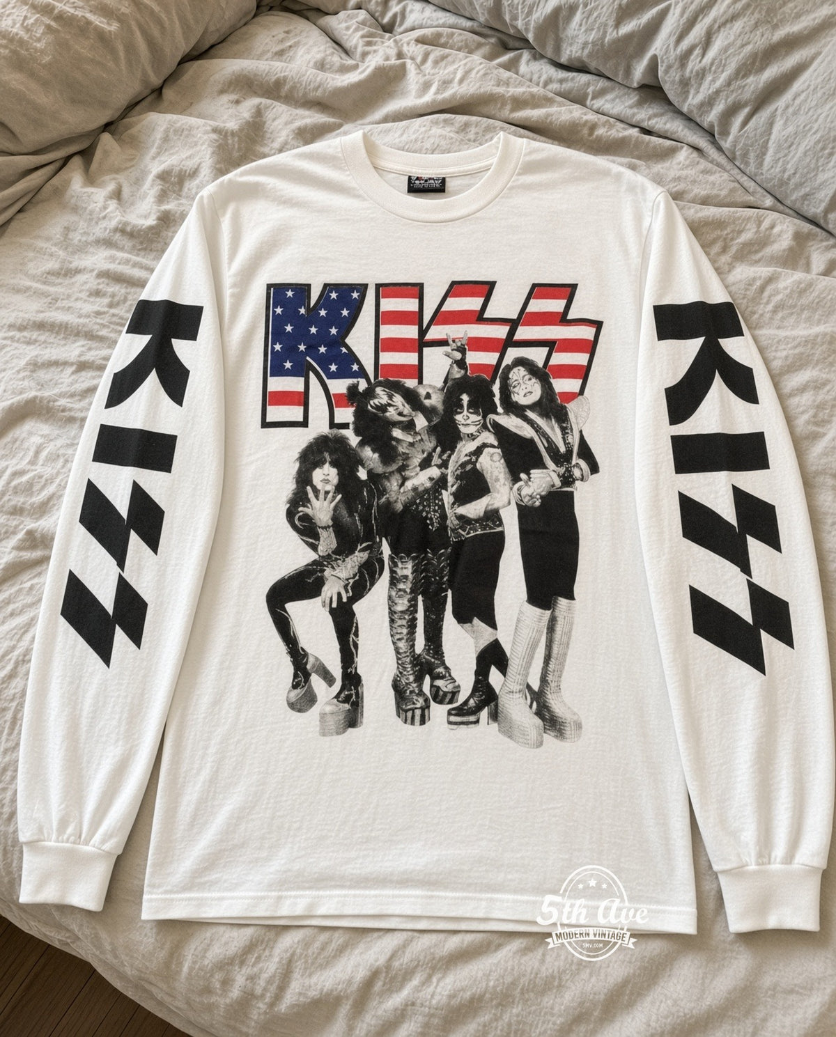 ETS LS 74 KISS Flag Logo Band long sleeve vintage tee laid on a bed