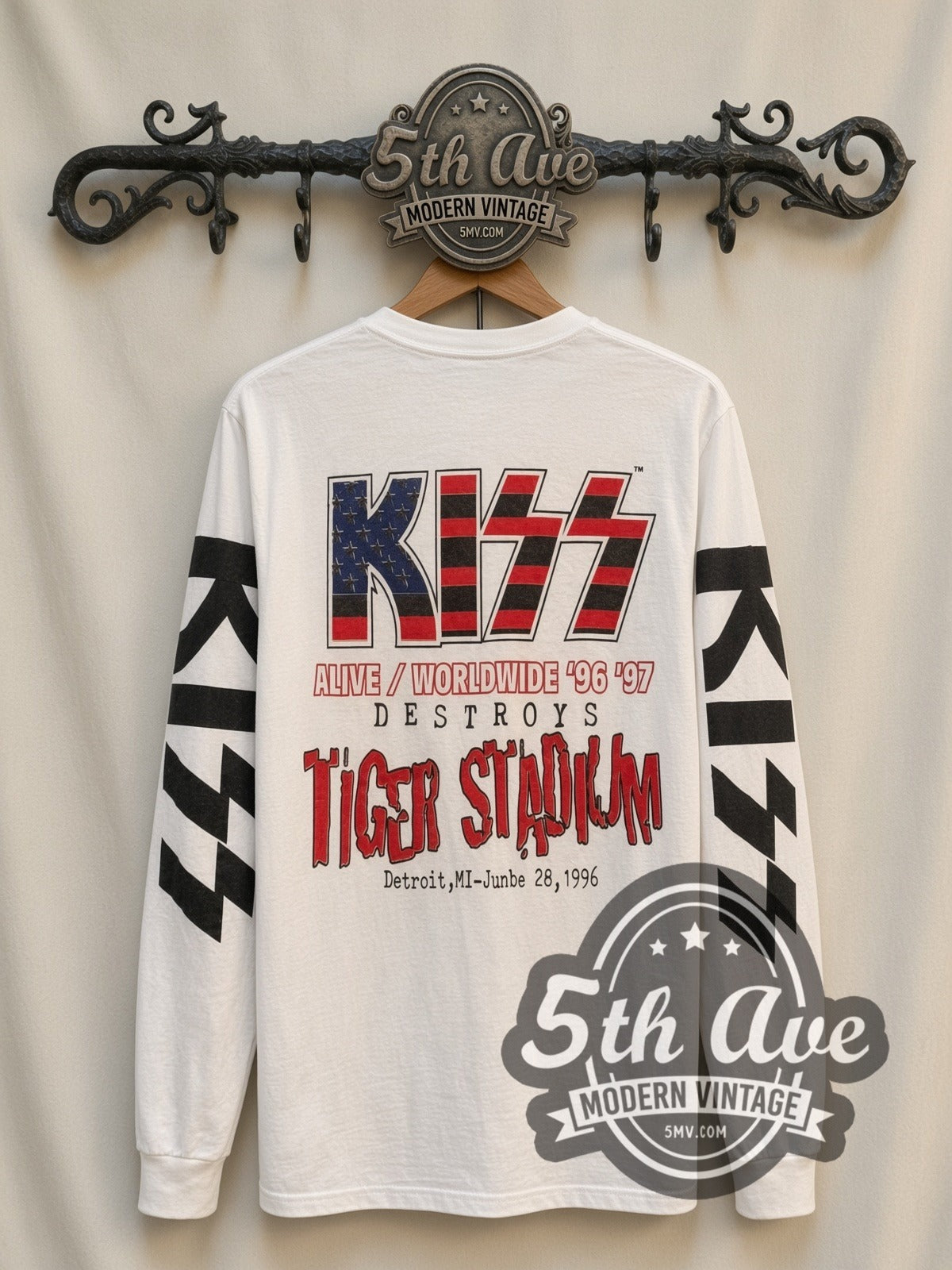 KISS Flag Logo Band vintage band long sleeve t-shirt, back view on a display rack