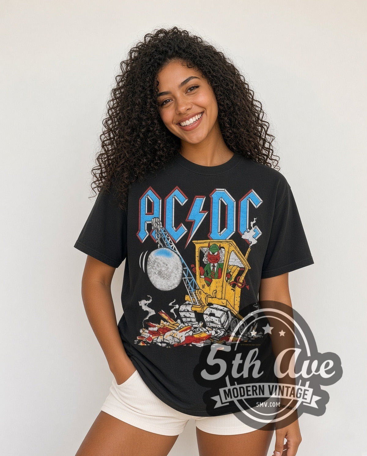 Model wearing the AC/DC Cannon vintage band t-shirt in black