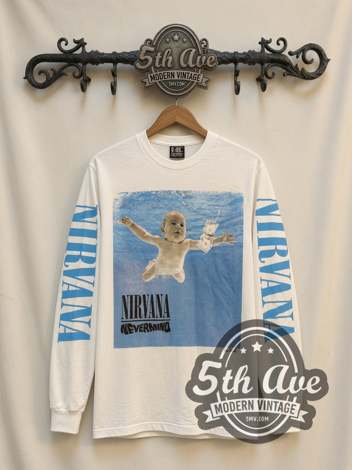 Nirvana Nevermind vintage band long sleeve t-shirt in white, front view on a display rack
