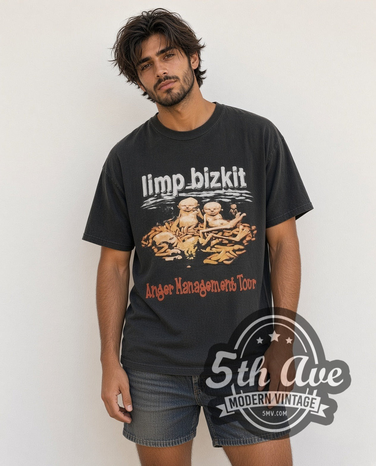Model wearing the Limp Bizkit Anger Management Green Leaf Eminem Papa Roach vintage band t-shirt in black