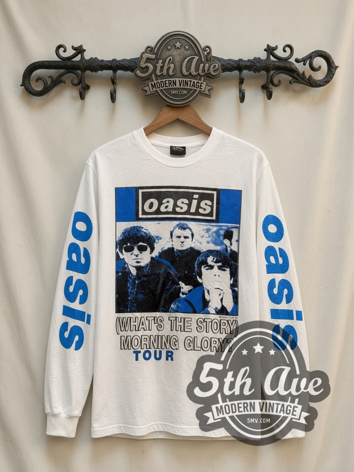 Oasis Morning Glory Tour vintage band long sleeve t-shirt in white, front view on a display rack