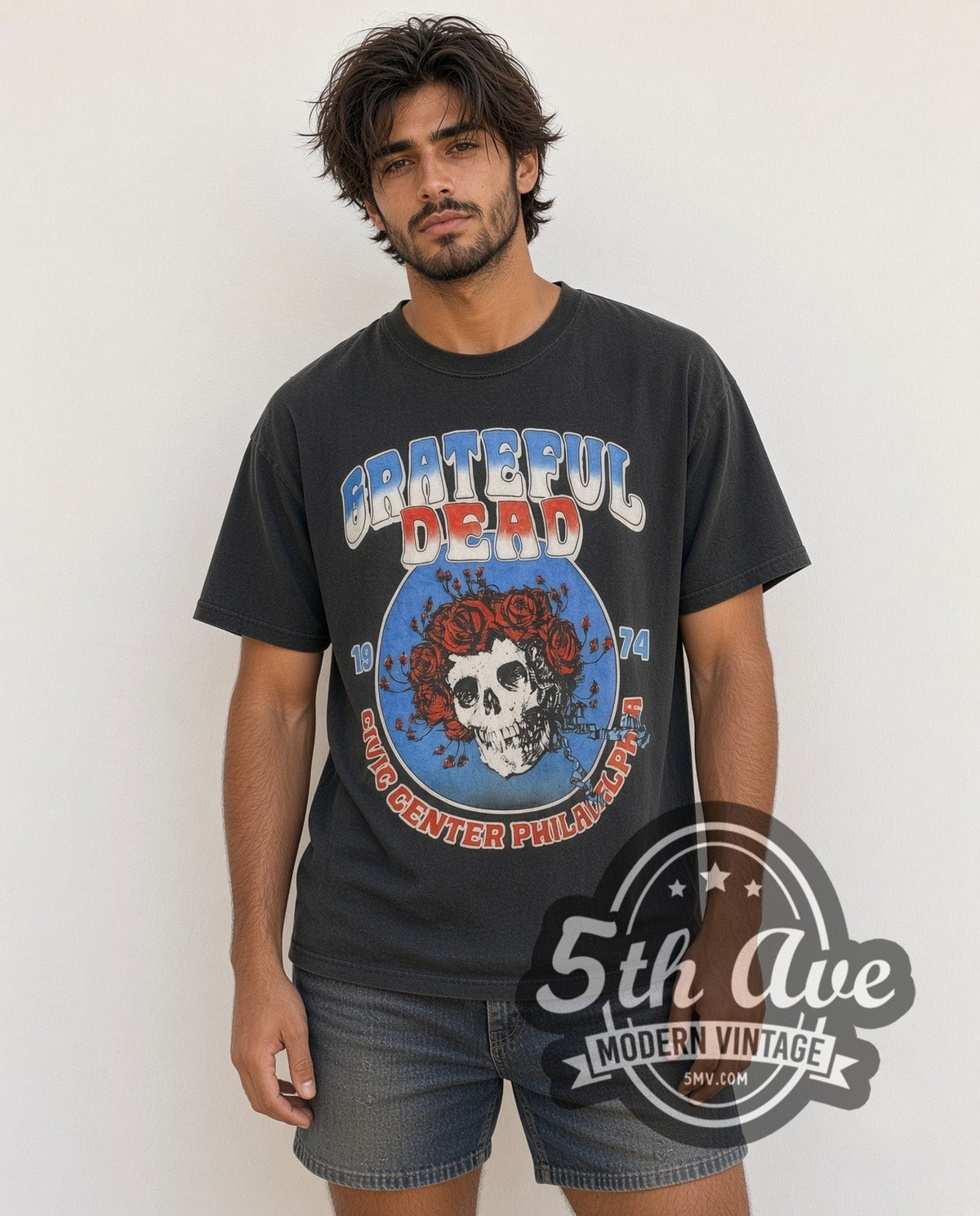 Model wearing the Grateful Dead Live at Philadelphia Civic Center 1974 vintage band t-shirt in black