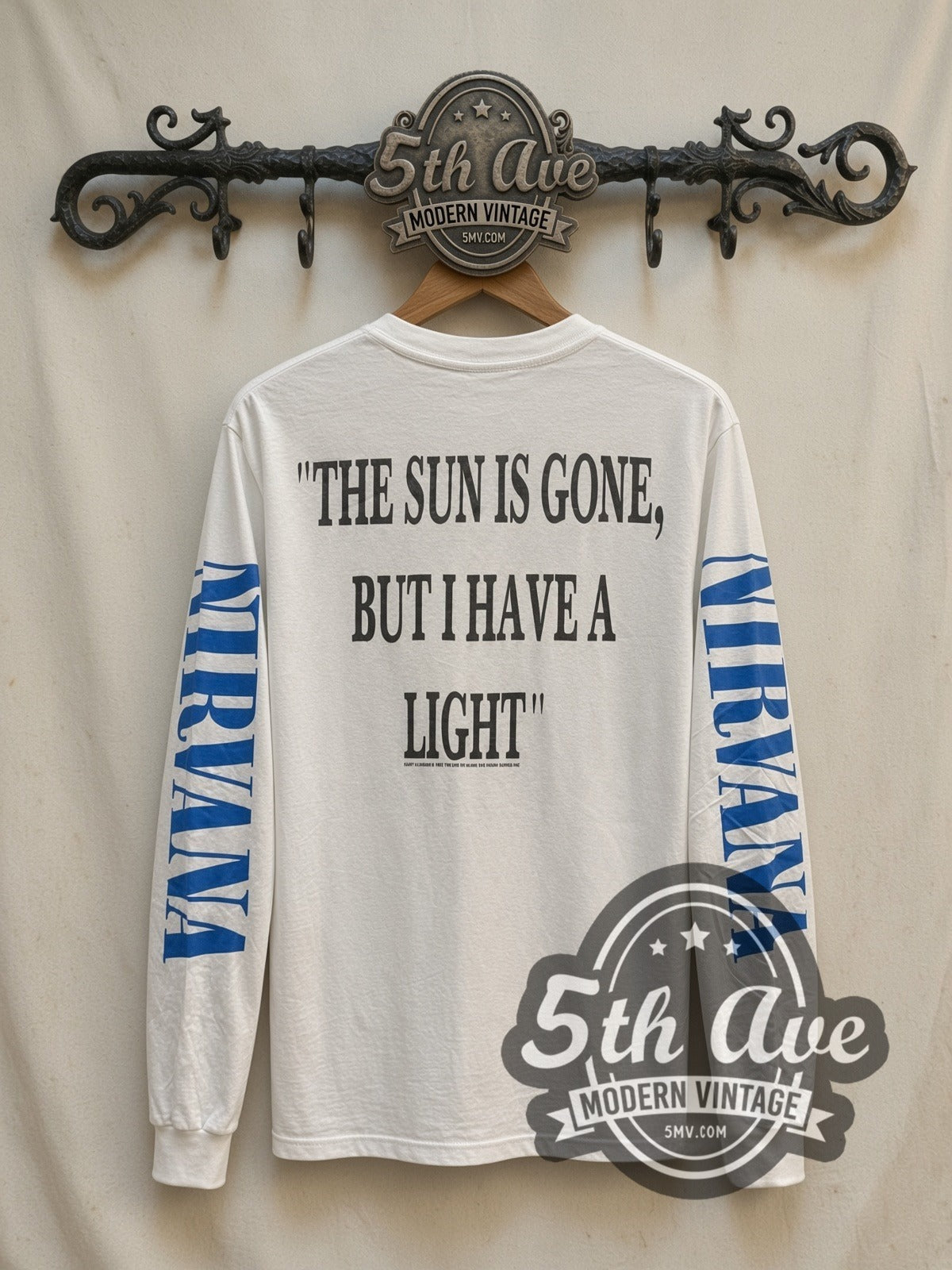Nirvana Young Kurt Cobain vintage band long sleeve t-shirt, back view on a display rack