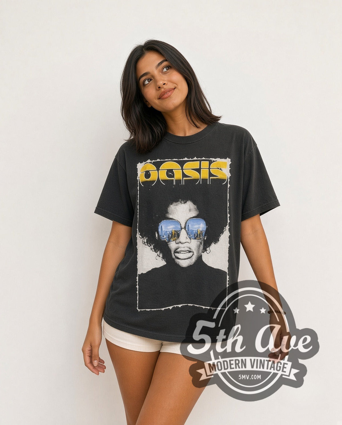 Model wearing the Oasis The Charlatans, Black Rebel Motorcycle Club, Proud Mary and The Coral vintage band t-shirt in black